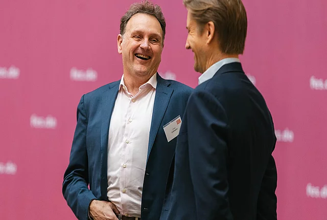 two participants socializing 